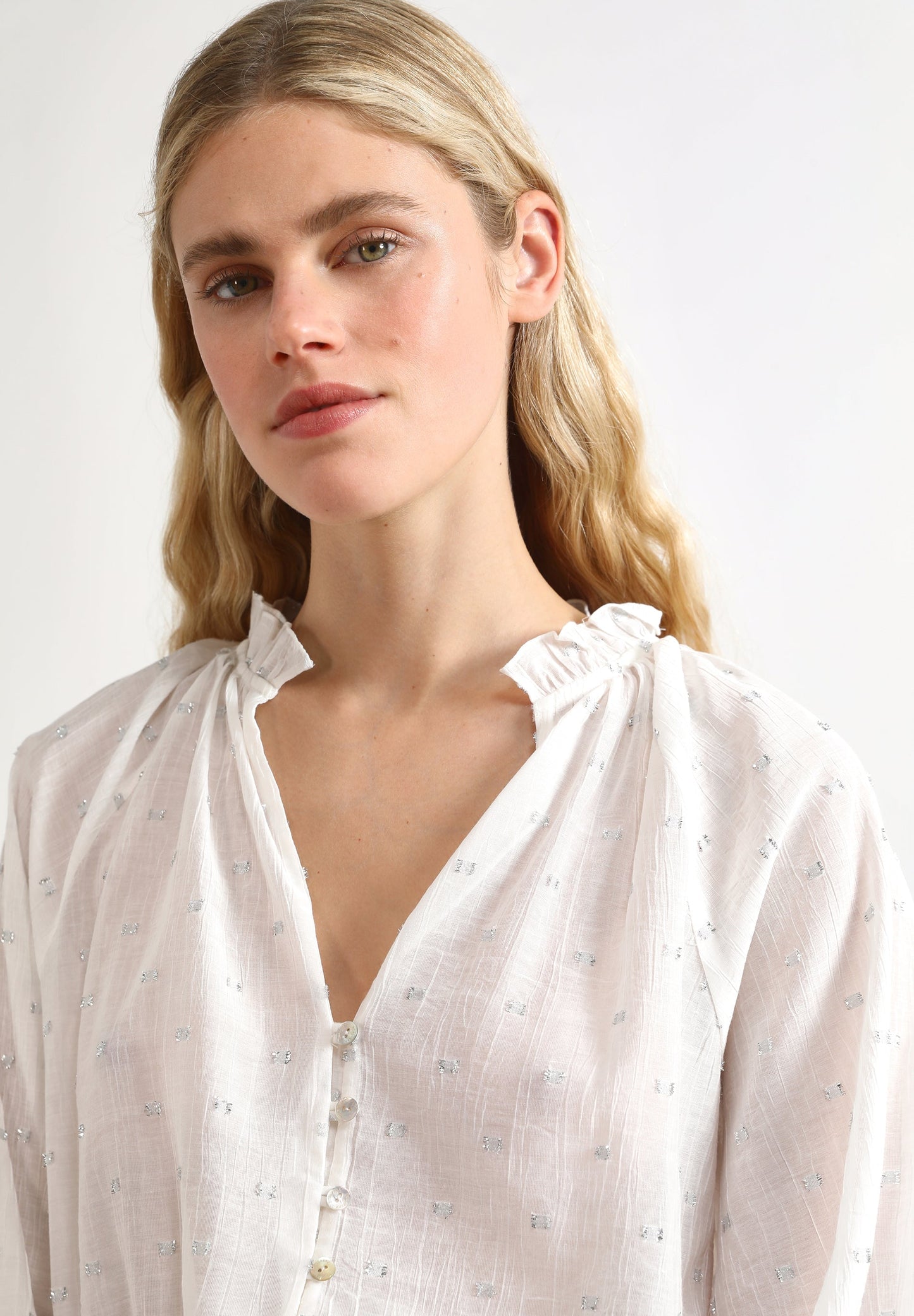 BLUSA DETALLES METALIZADOS