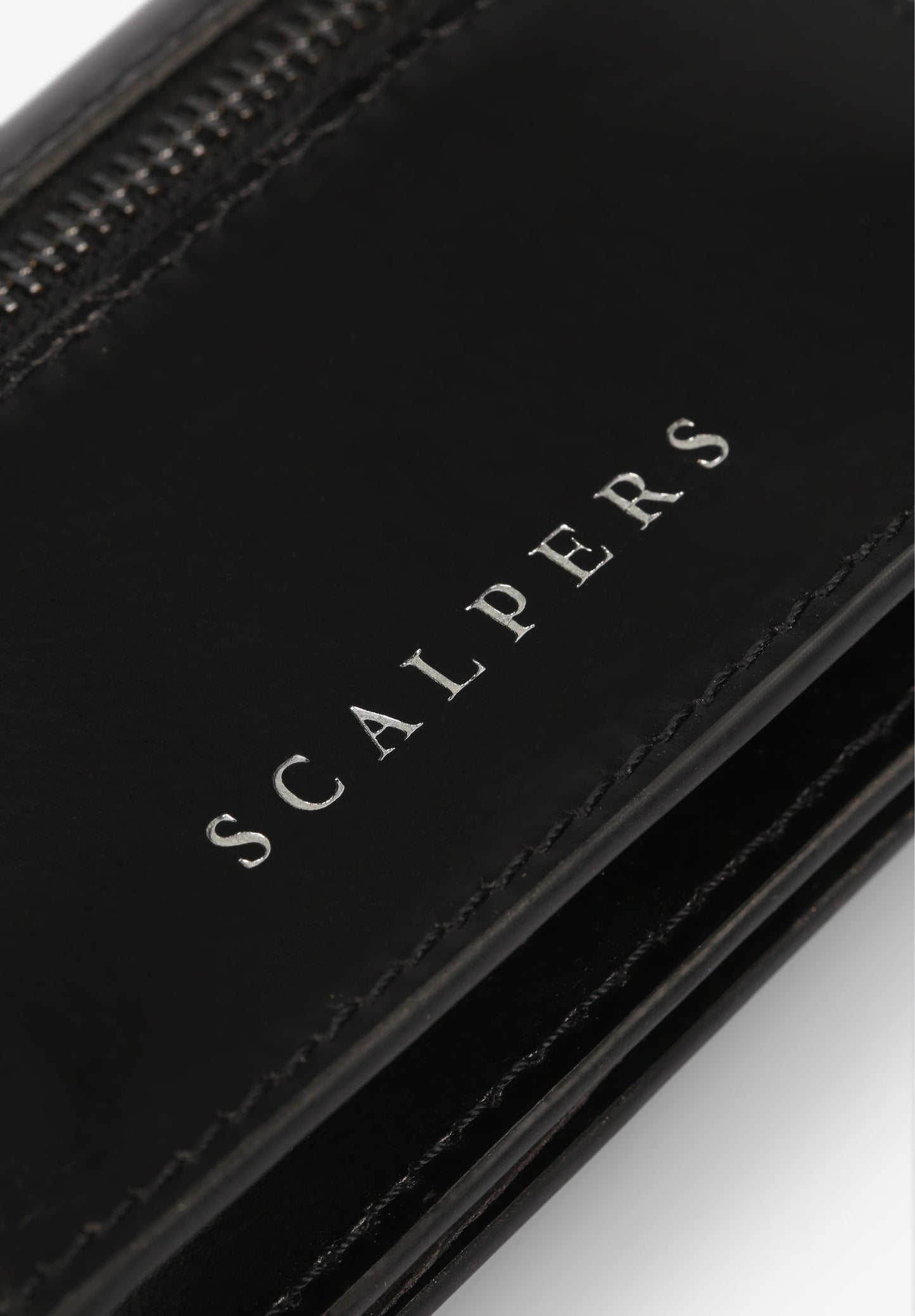 CARTERA MINI TACHUELAS