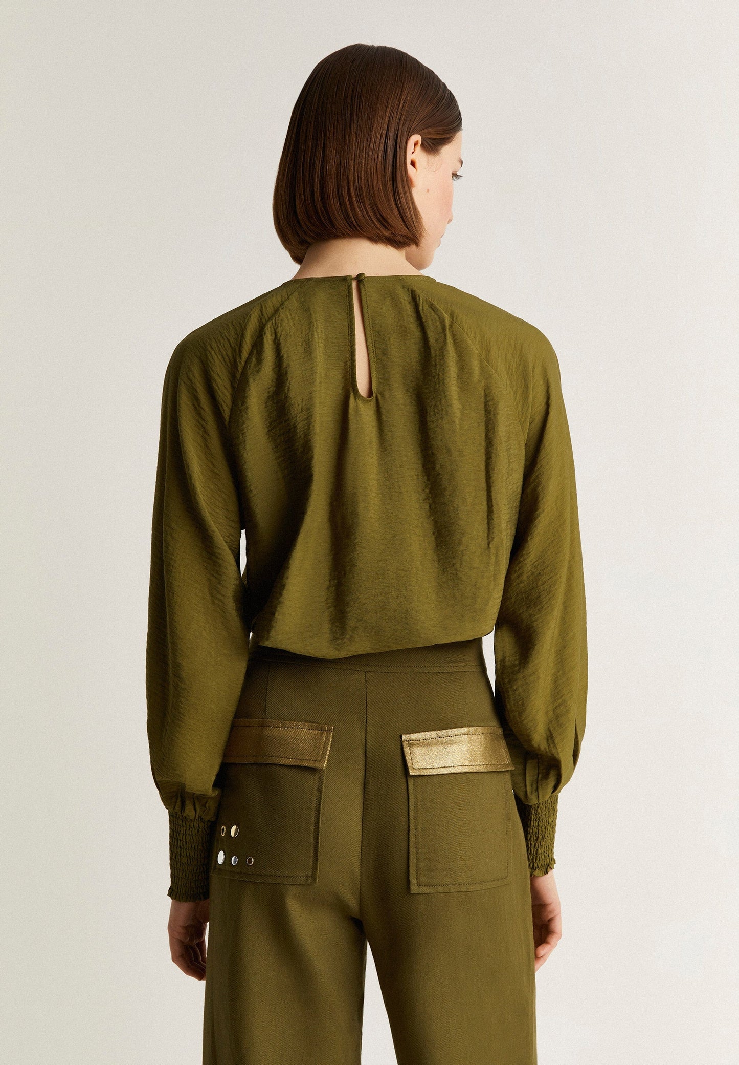 BLUSA DETALLE ABERTURAS