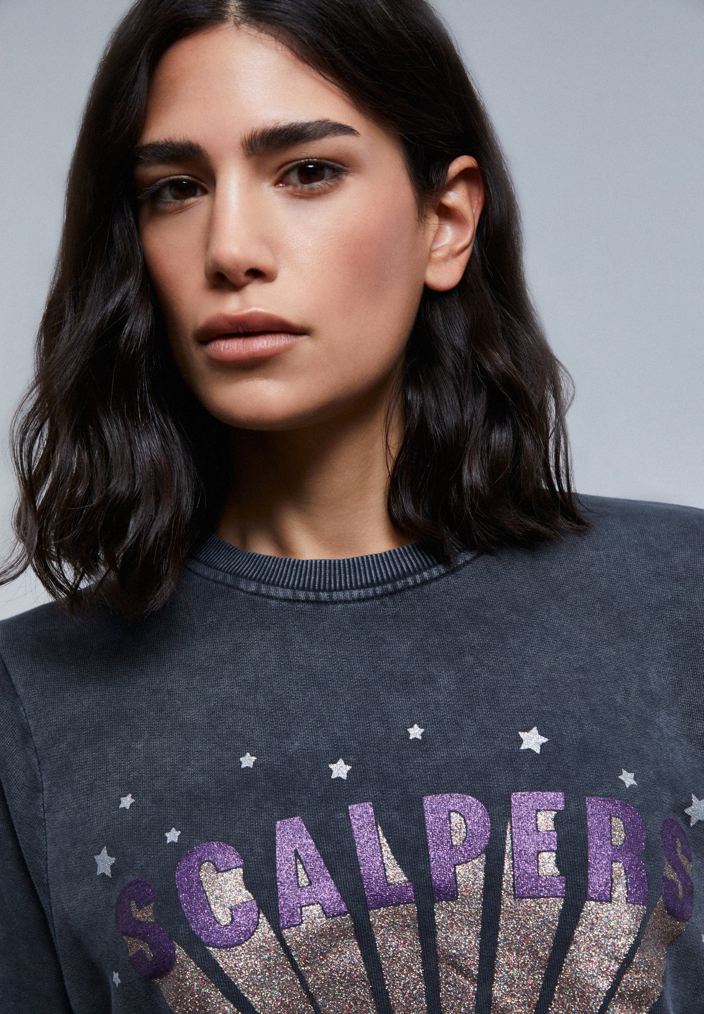 BUZO LAVADA LOGO GLITTER