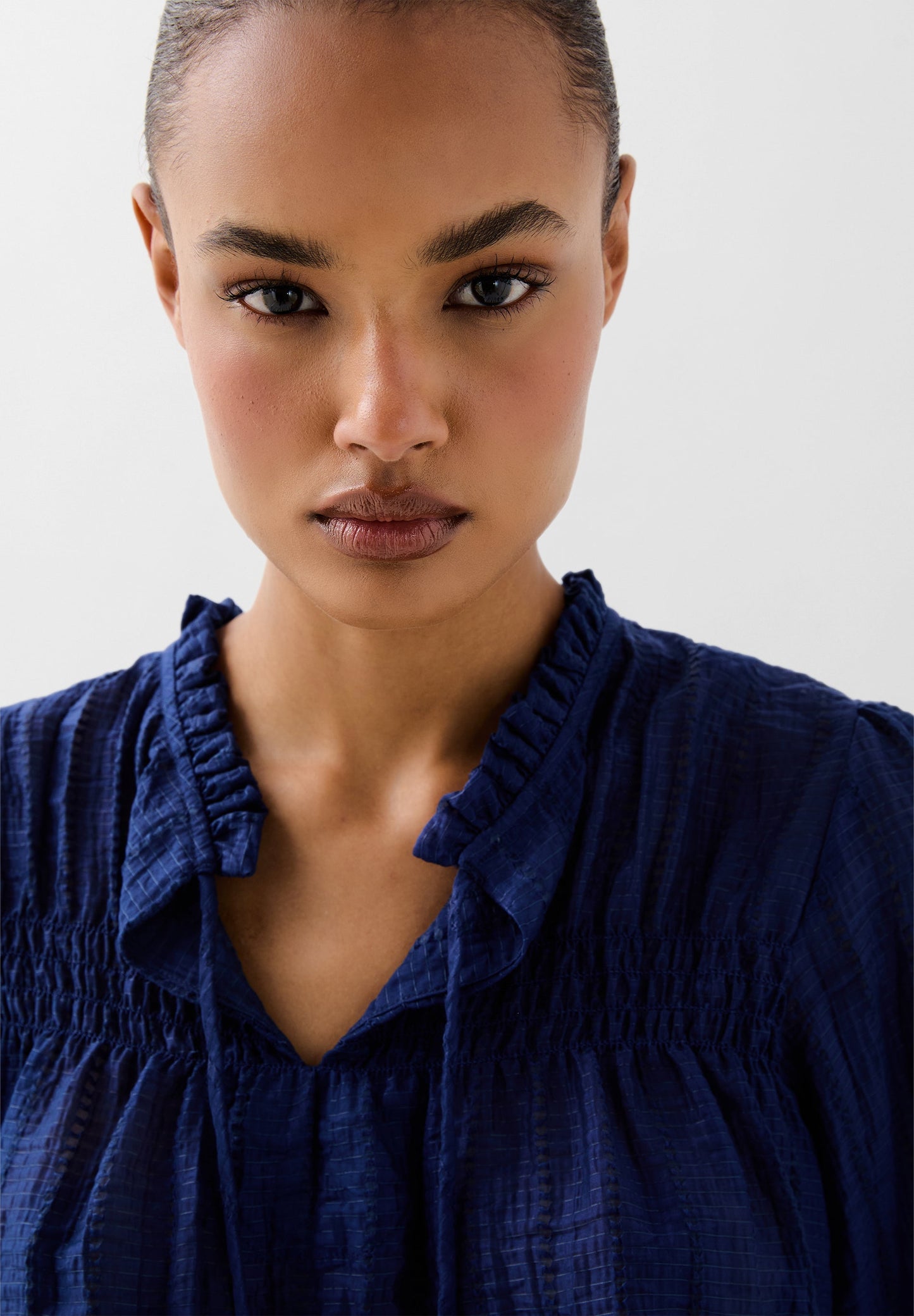 BLUSA FLUIDA DETALLES